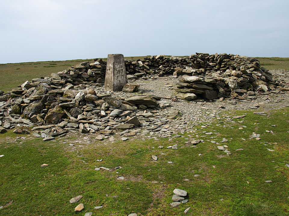 The shelter and trig column at the summit