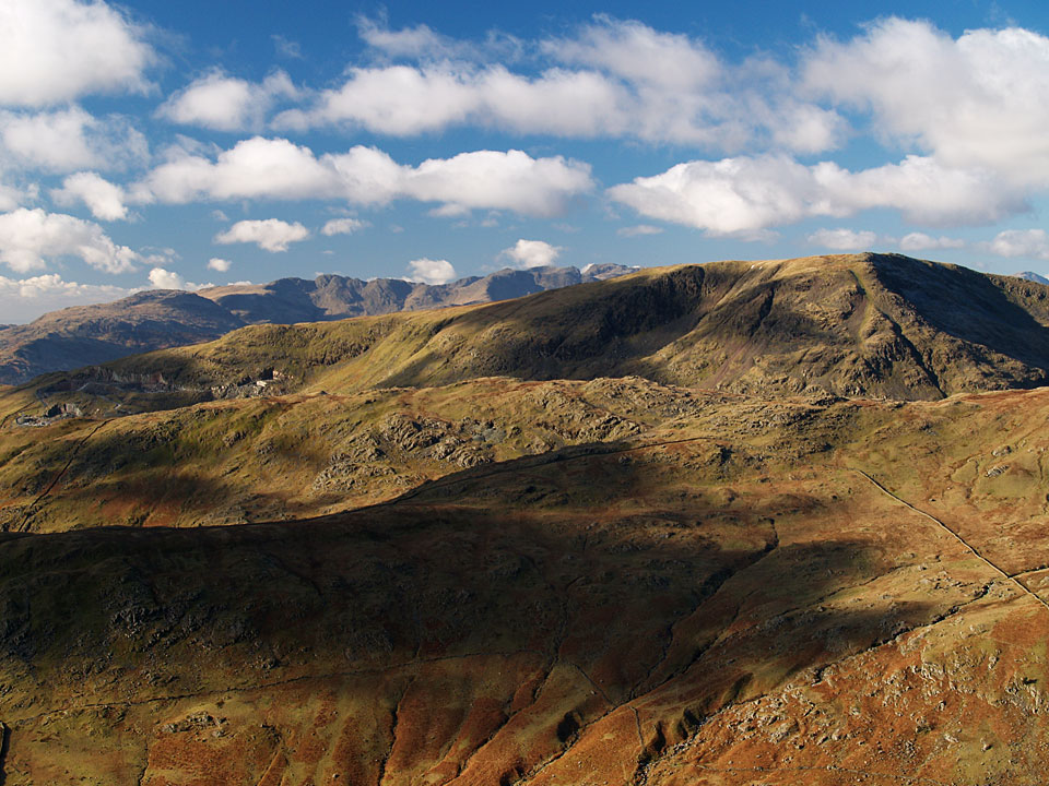 Red Screes over Caudale Moor with Lingmoor Fell, Crinkle Crags and Bow Fell beyond, from Froswick
