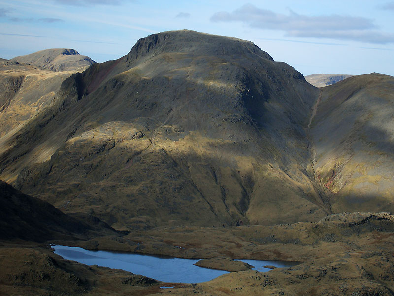 Pillar, Great Gable and Green Gable over Sprinkling Tarn from Allen Crags. 