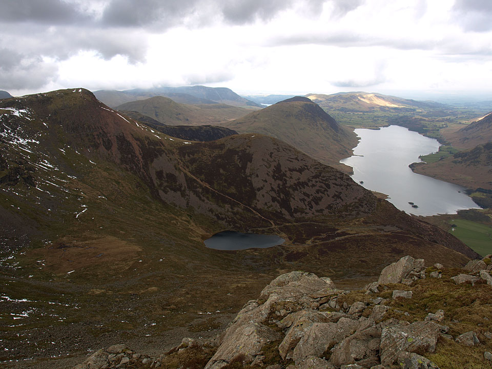 Looking over to Red Pike and Dodd beyond Bleaberry Tarn with Crummock Water and Mellbreak beyond