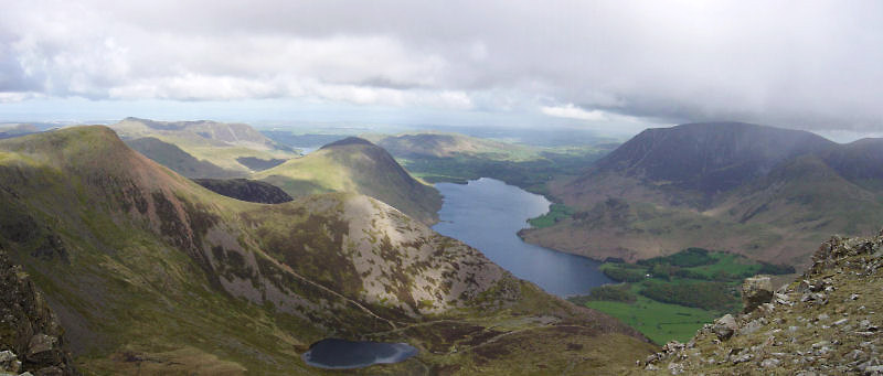 Looking from High Stile across Bleaberry Tarn and Red Pike to Mellbreak and Crummock Water. Loweswater is visible in the distance.