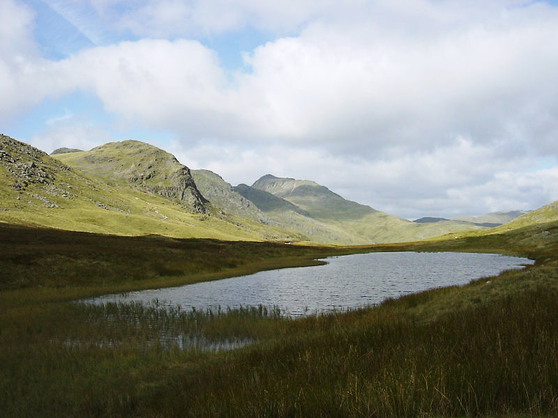 Looking across Red Tarn to Great Knott, the Crinkle Crags and Bow Fell